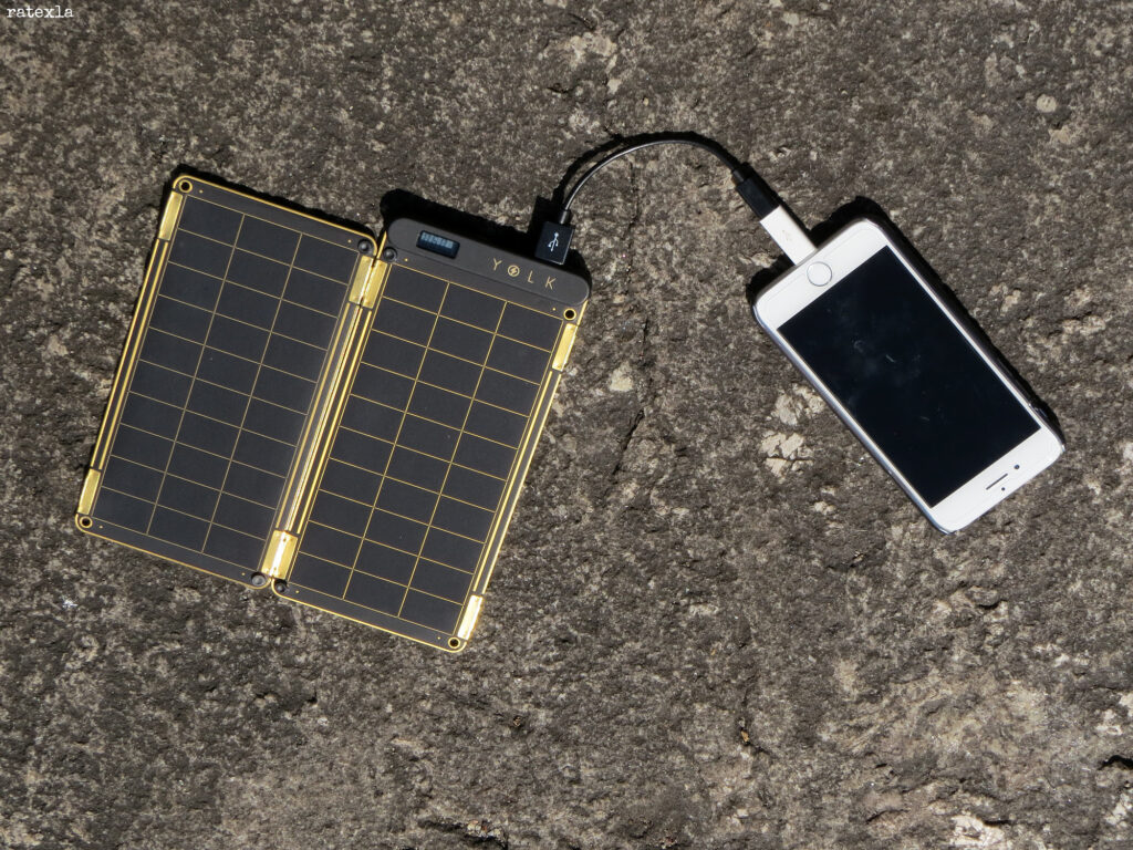  Solar charger from Yolk charging my iPhone,